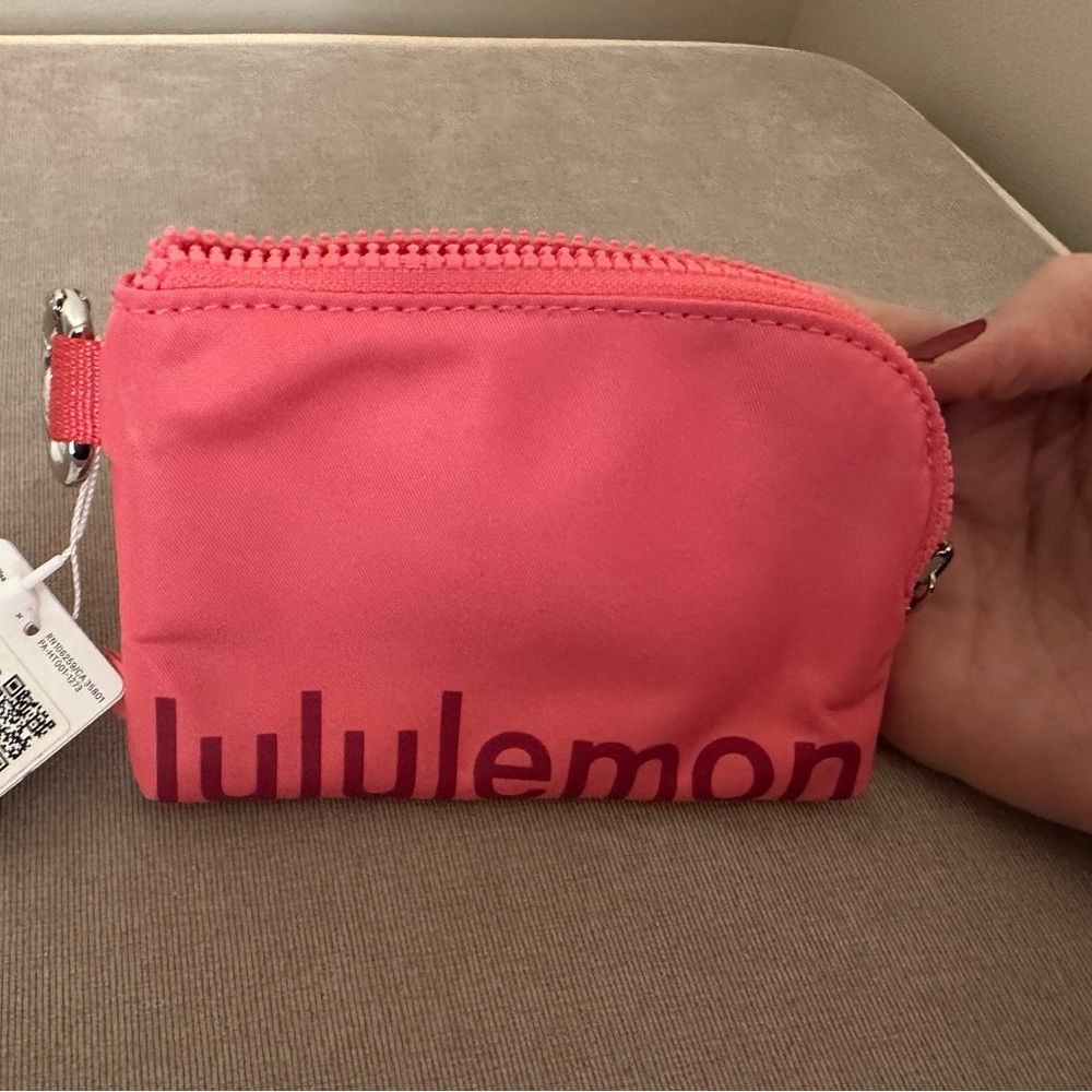 EUC Lululemon clippable card pouch Sakura pink